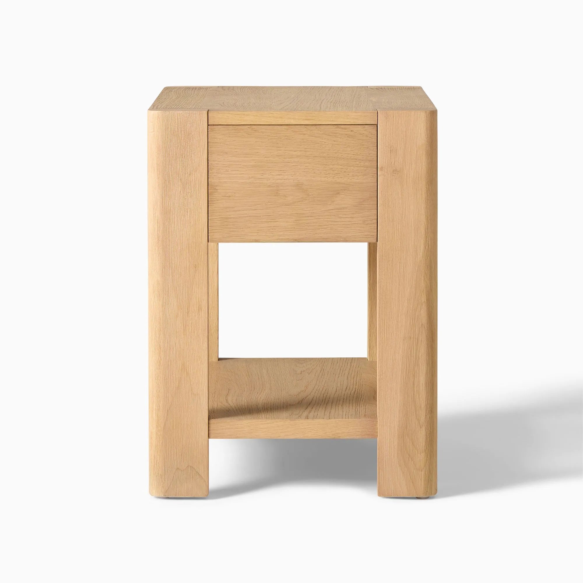 Elegant bedroom nightstand storage, featuring a drawer and open shelf