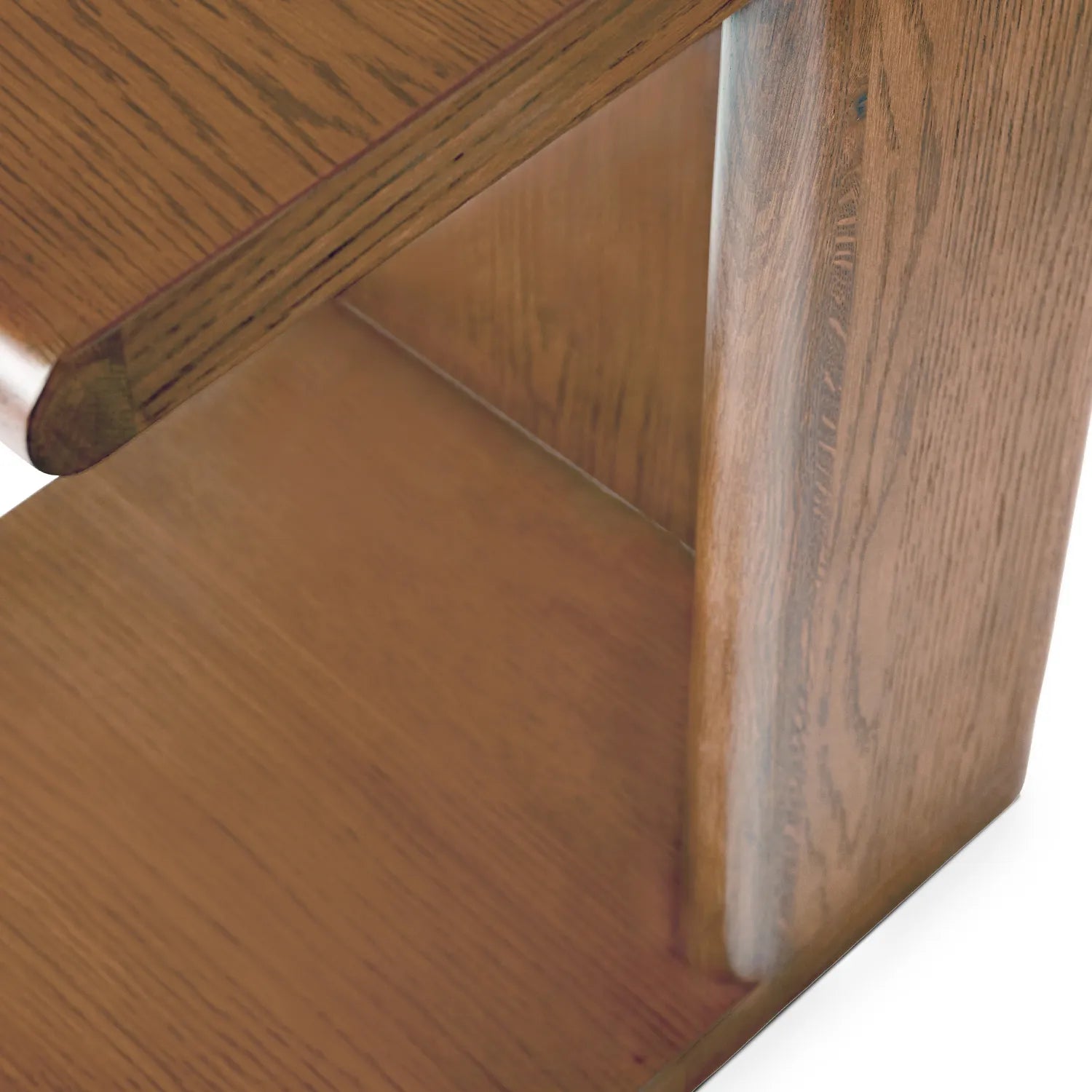 Modern C shaped side table with open base and curved edges perfect for small living spaces