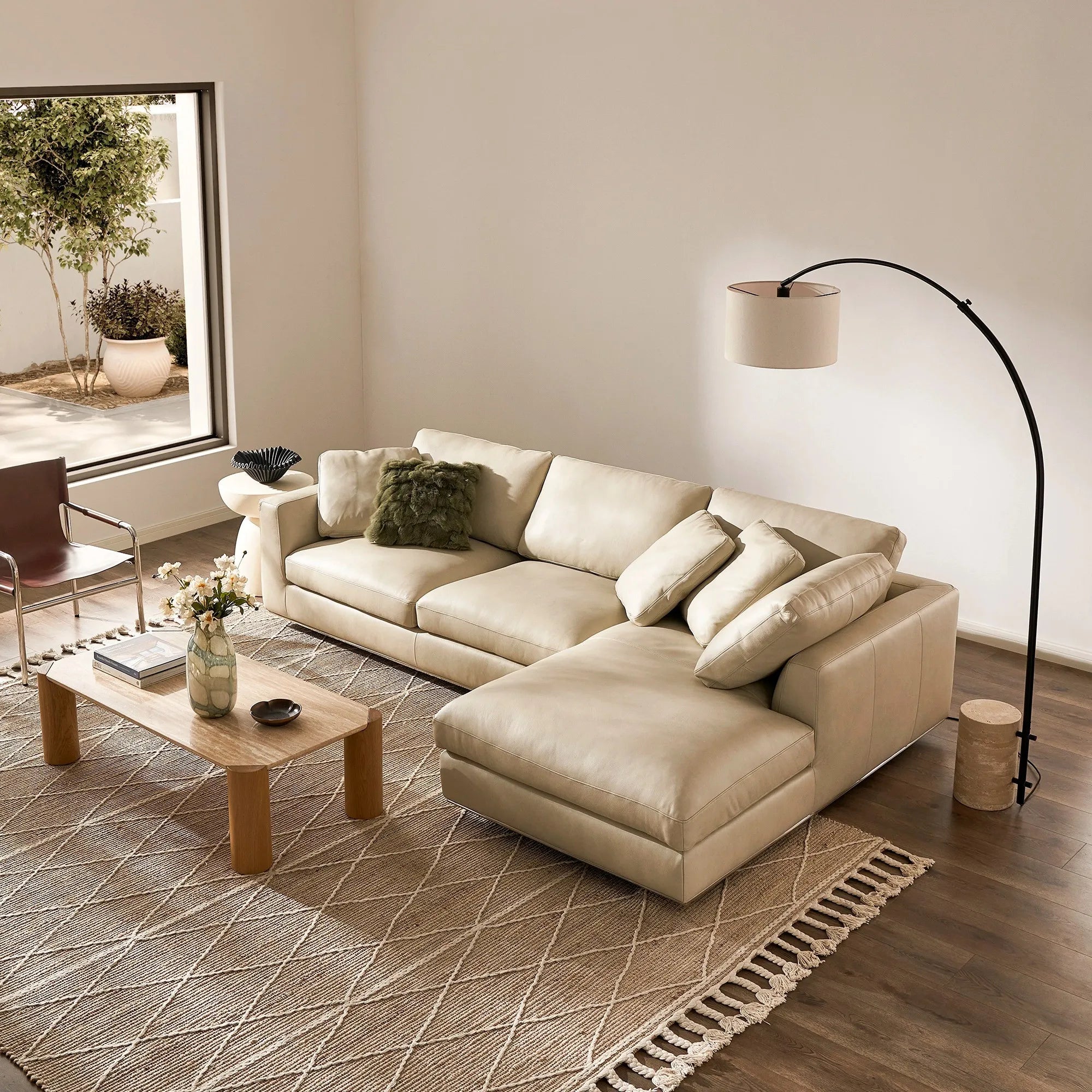 Rectangular modern coffee table with cylindrical legs and sleek design