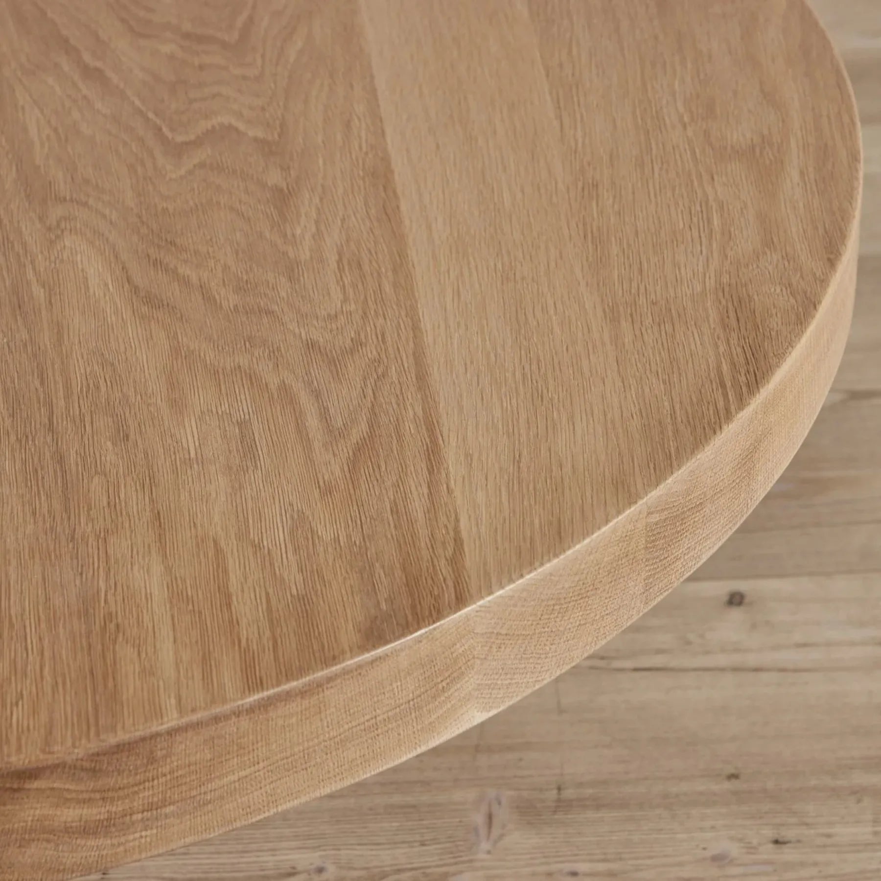 Round Low Profile Coffee Table with cylindrical legs and spacious tabletop