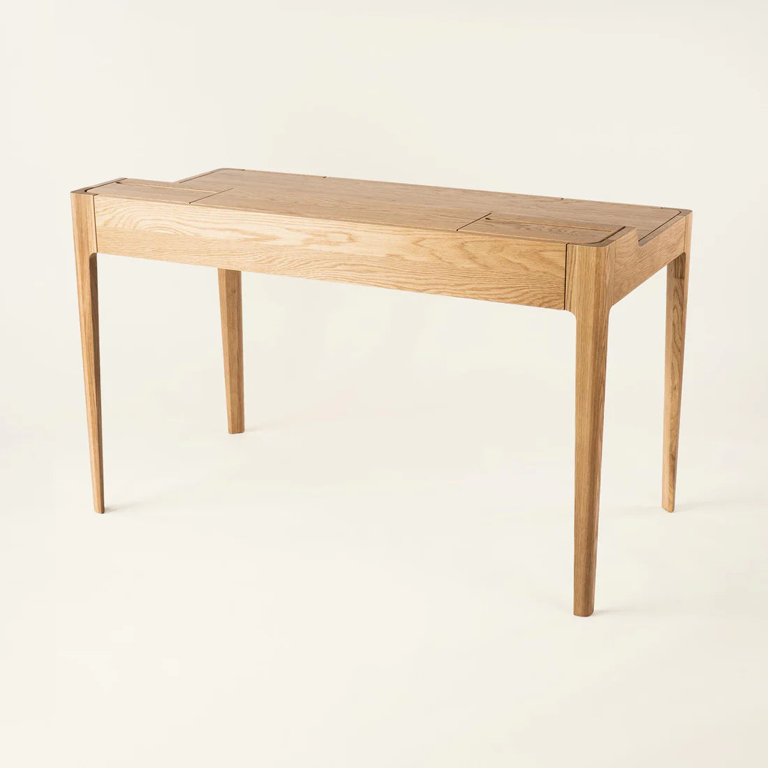 Smart Office Desk with built-in storage compartments and device slots in a modern workspace setting