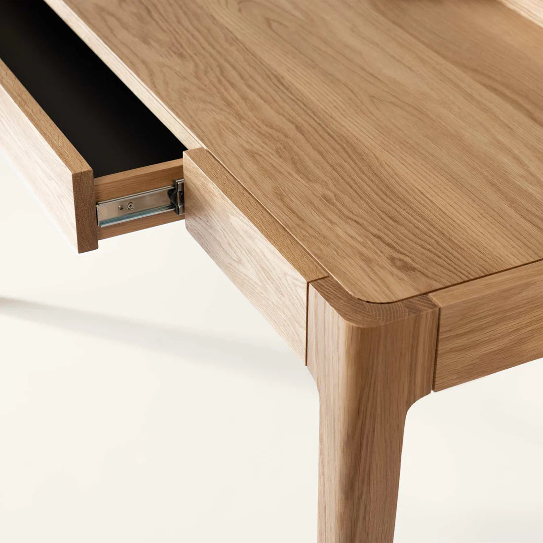 Smart Office Desk with built-in storage compartments and device slots in a modern workspace setting