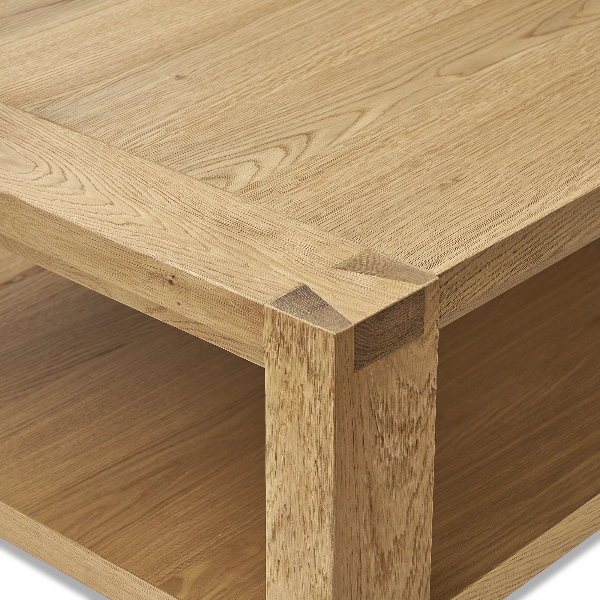 Square modern coffee table with open shelf for storage