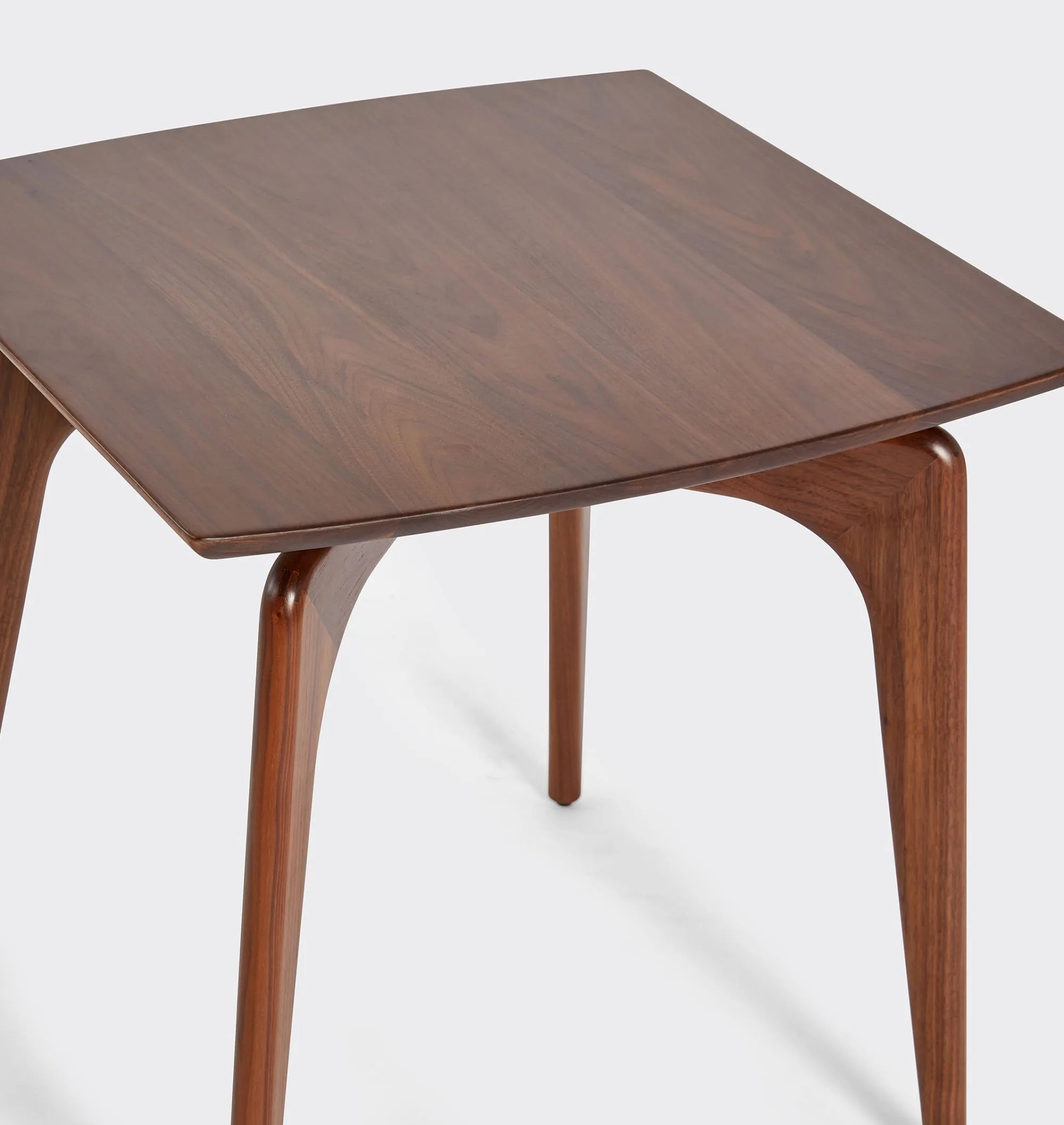 Timeless Mid-Century Modern Side Table with tapered legs.