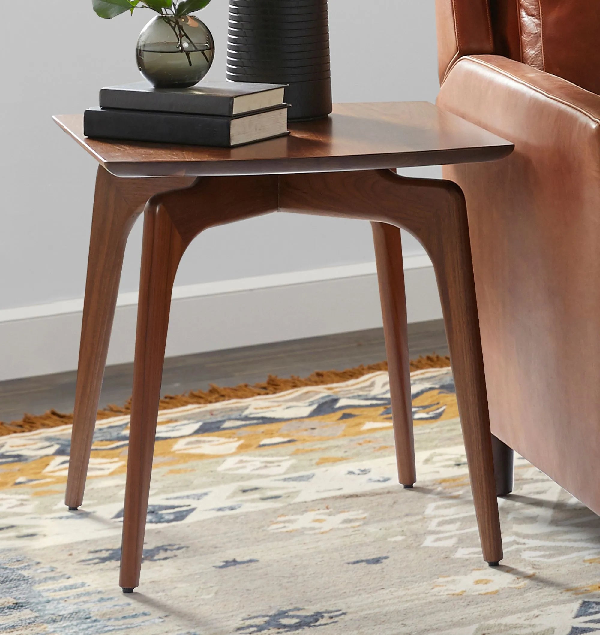 Timeless Mid-Century Modern Side Table with tapered legs.