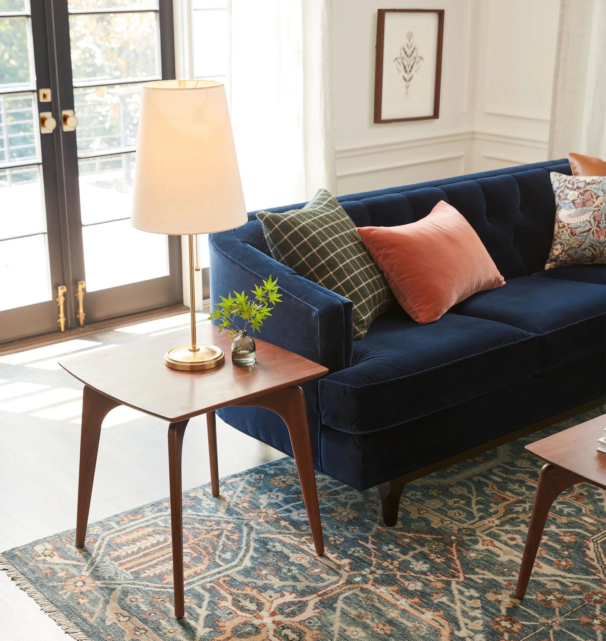 Timeless Mid-Century Modern Side Table with tapered legs.