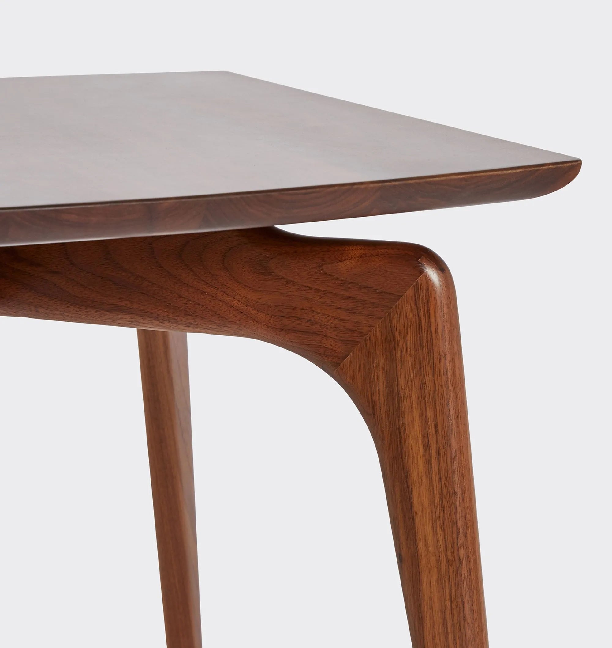 Timeless Mid-Century Modern Side Table with tapered legs.