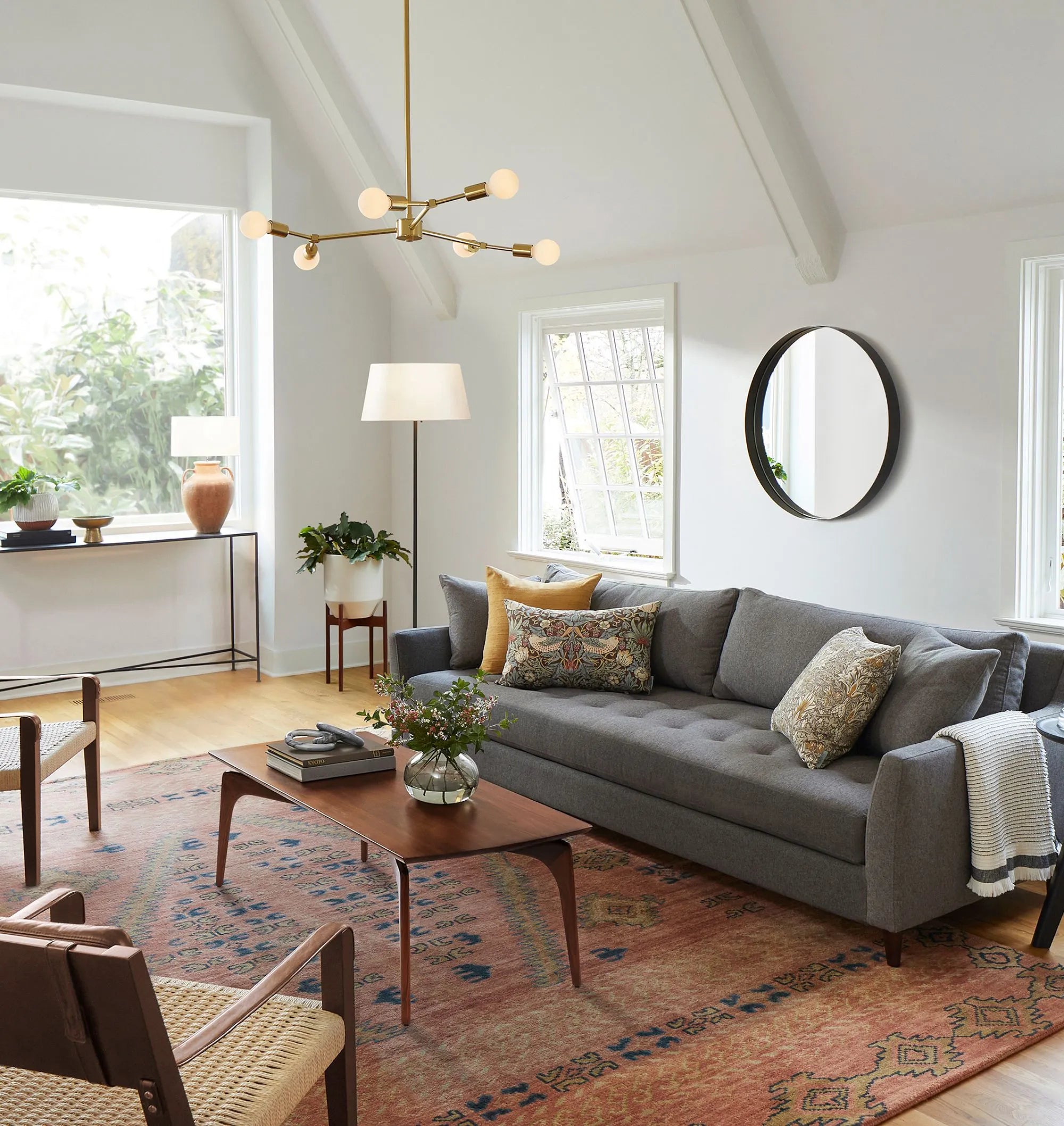 Timeless mid century coffee table with curved edges and tapered legs.
