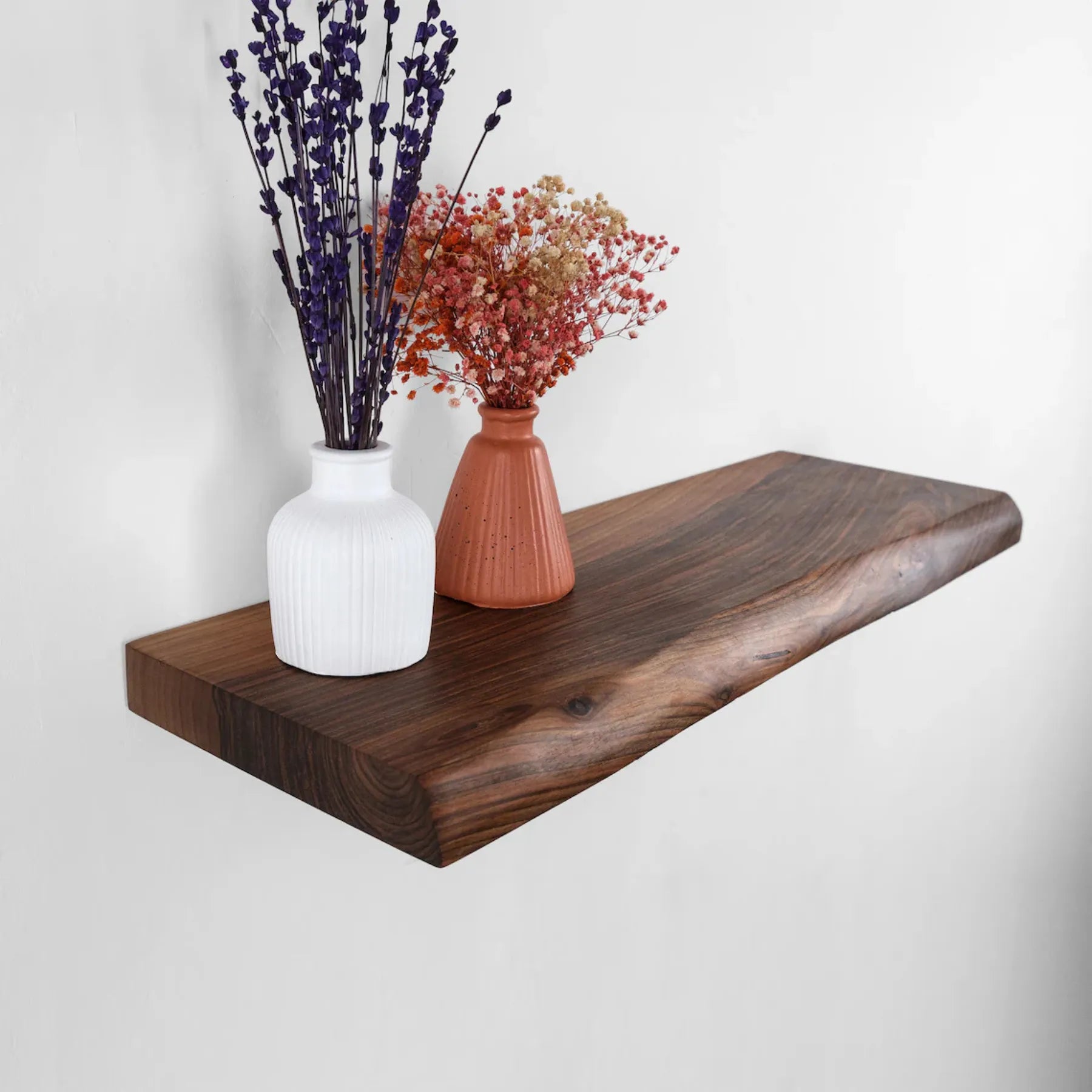 Wall mounted shelf natural edge floating design with decorative items