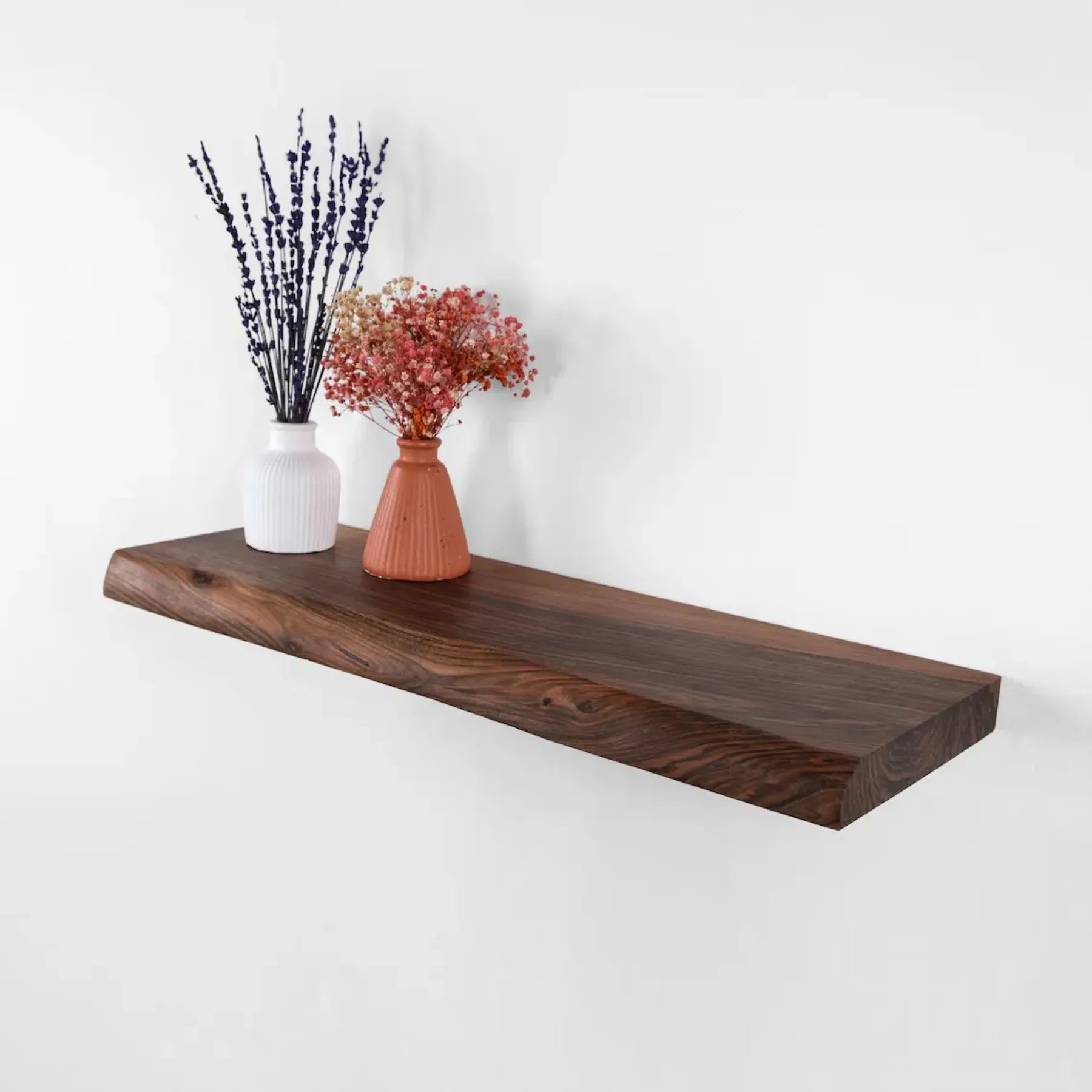 Wall mounted shelf natural edge floating design with decorative items
