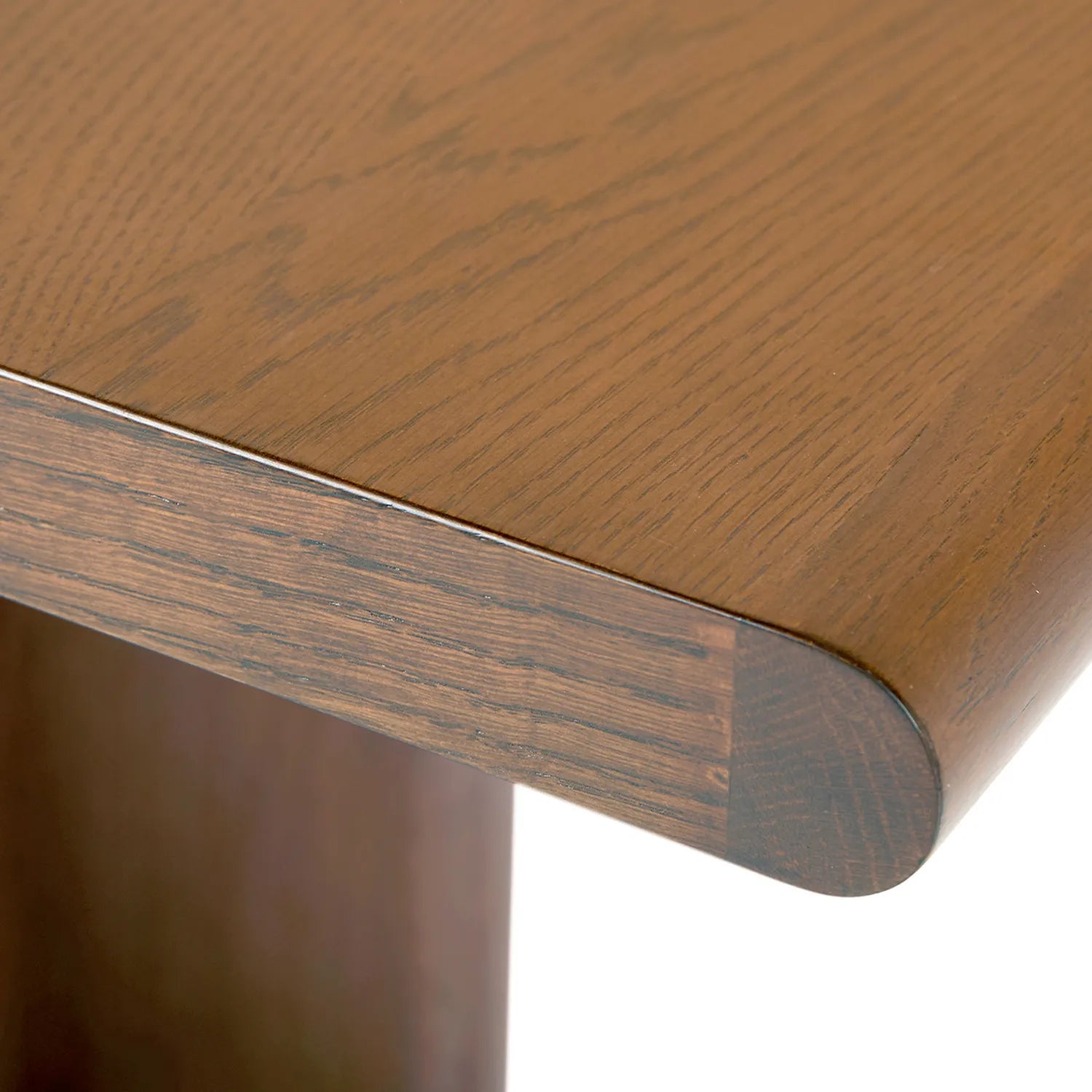Modern C shaped side table with open base and curved edges perfect for small living spaces