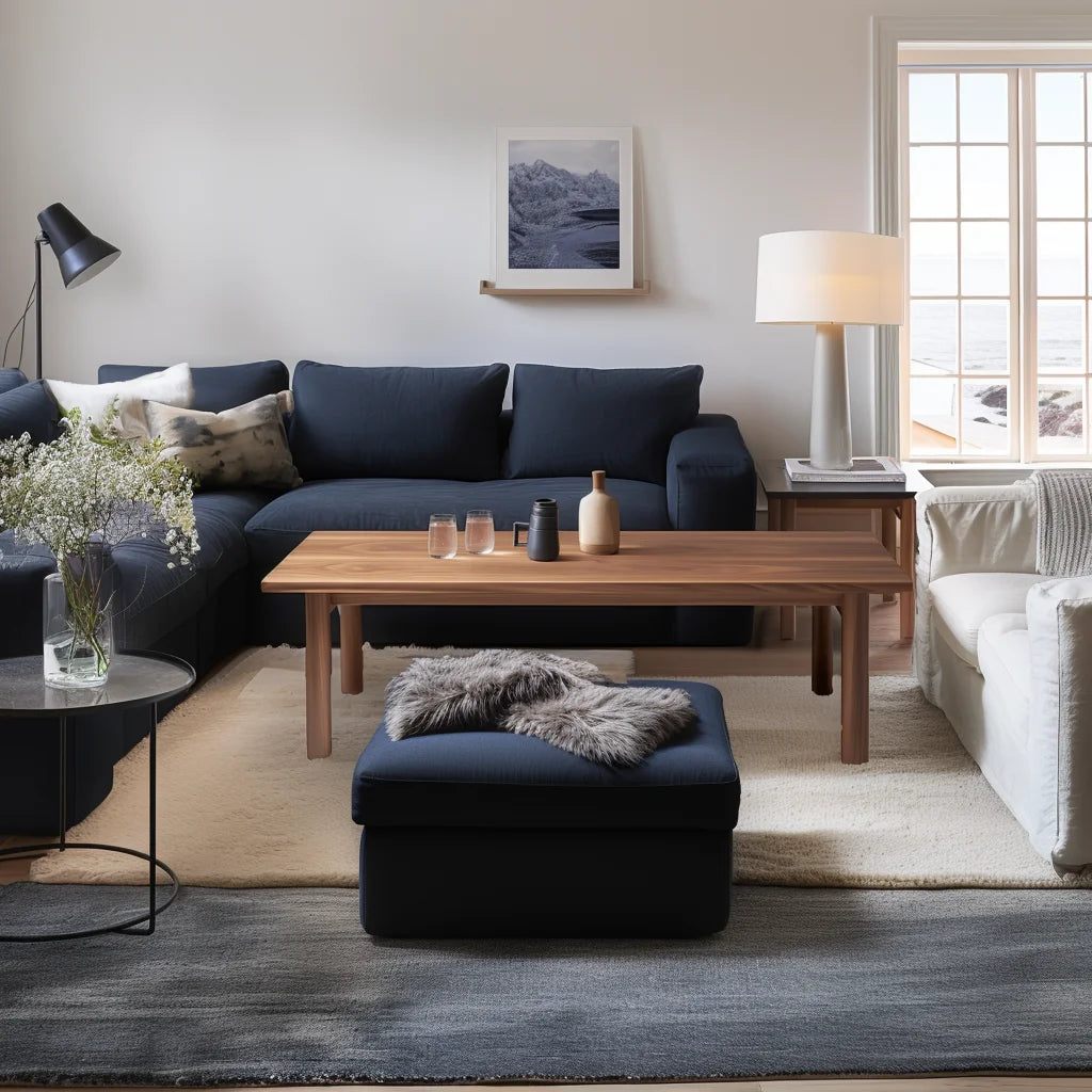 Refined coffee table with smooth edges and minimalist design in a dark blue modern living room