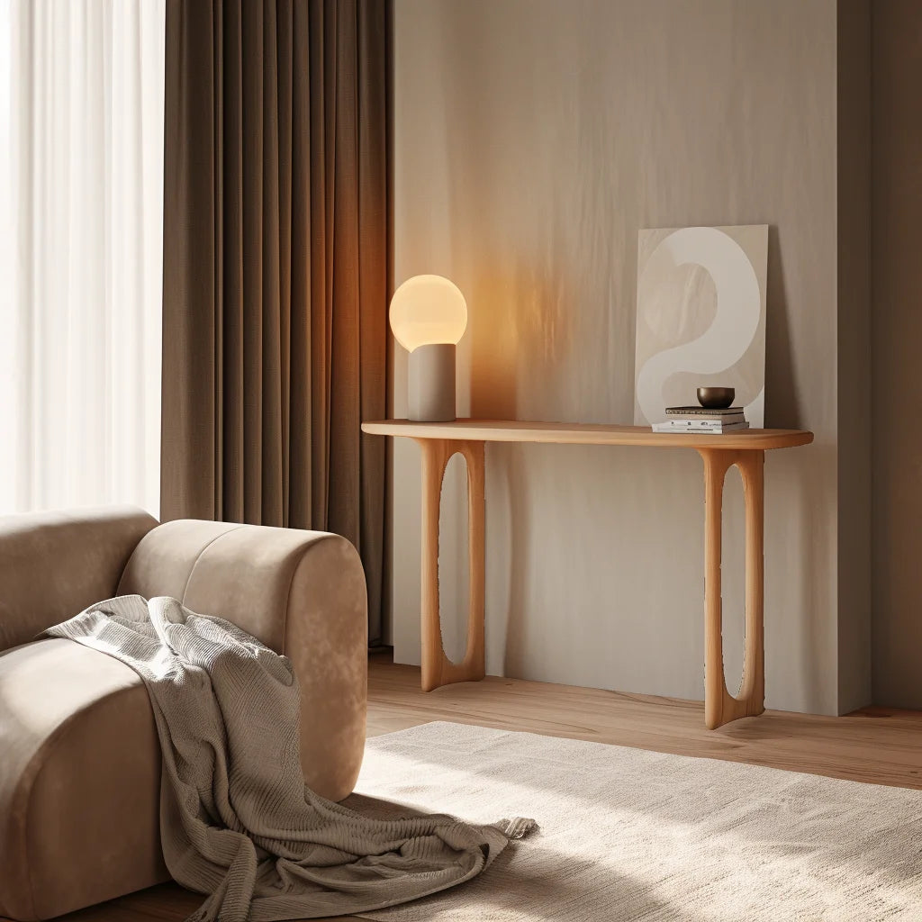 Sculpted Console Table with cut-out legs styled in a cozy modern living room