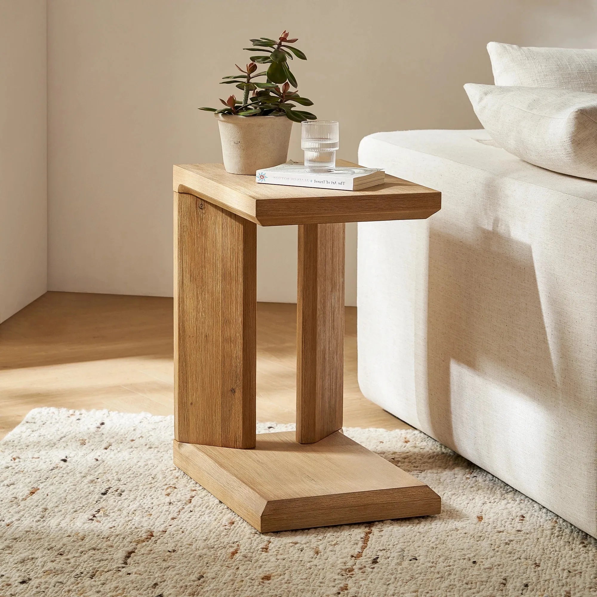 Versatile side table with a sleek modern design, perfect for compact spaces and everyday convenience.