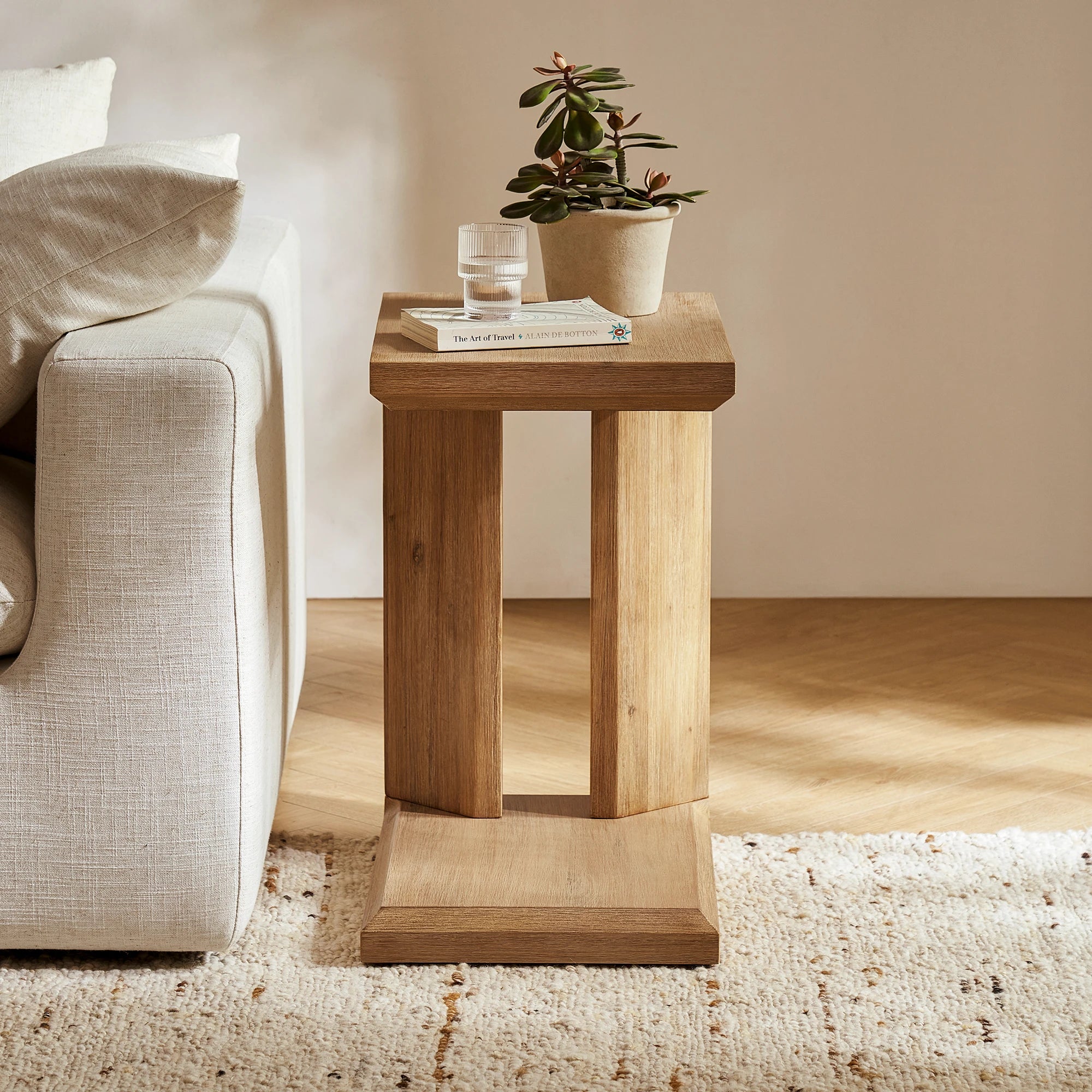 Versatile side table with a sleek modern design, perfect for compact spaces and everyday convenience.