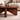 Modern Natural Wood Coffee Table With Round Top And Sculptural Cross Base For Living Room