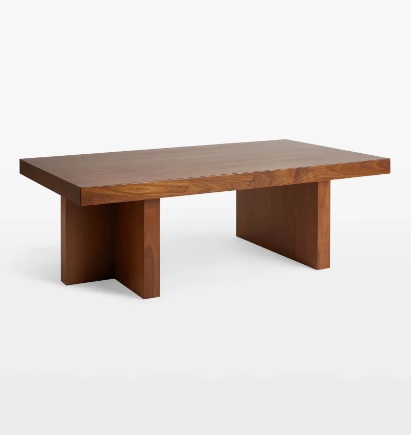 Minimalist coffee table featuring bold geometric design and smooth surface.