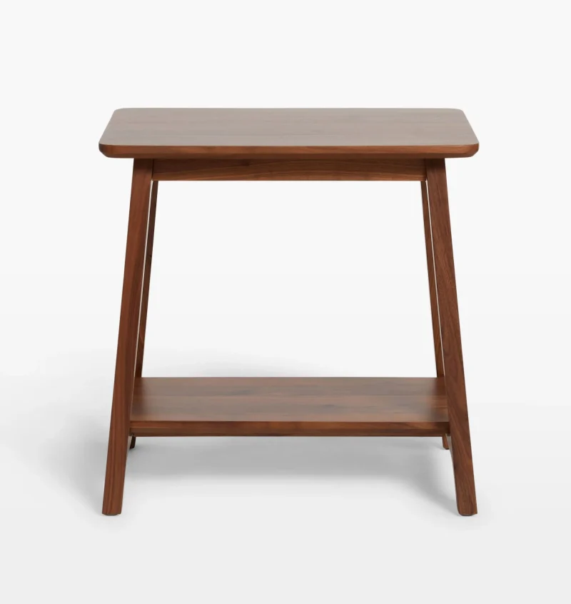 Elegant compact wooden side table with open lower shelf in a cozy room