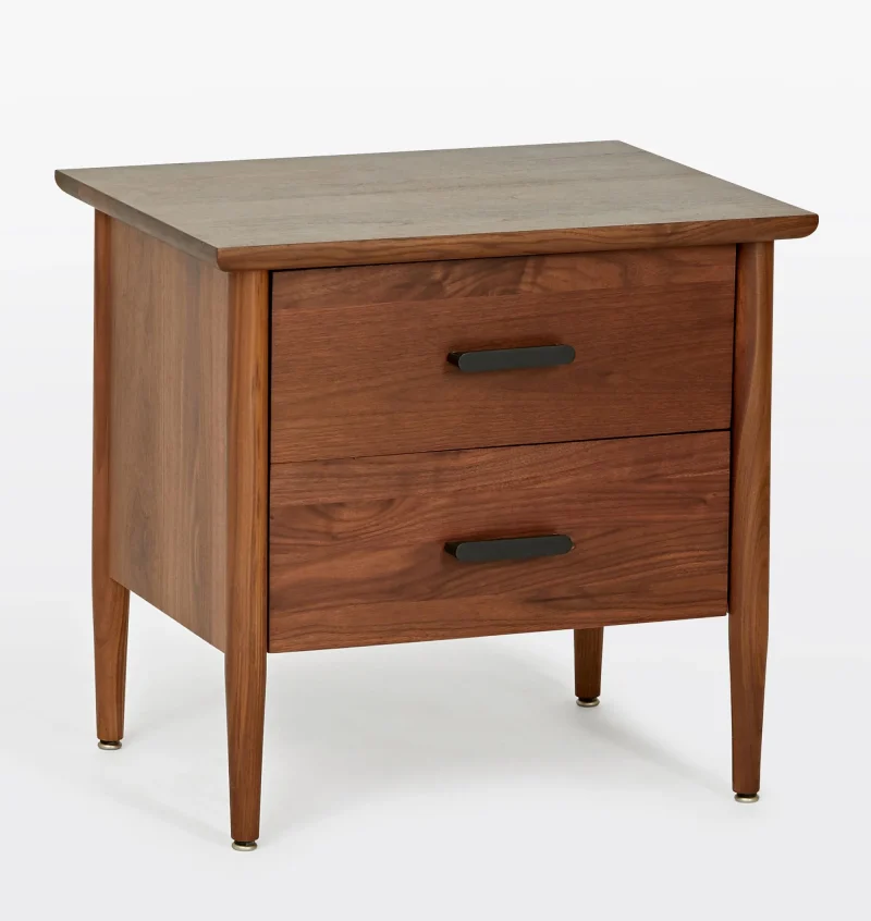 Mid century nightstand with double drawers, tapered legs, and black metal handles.