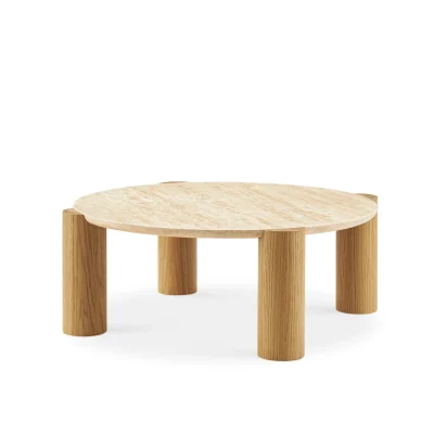 Round modern coffee table with cylindrical legs and sleek design
