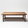 Essential coffee table with lower shelf in a modern living room with neutral tones