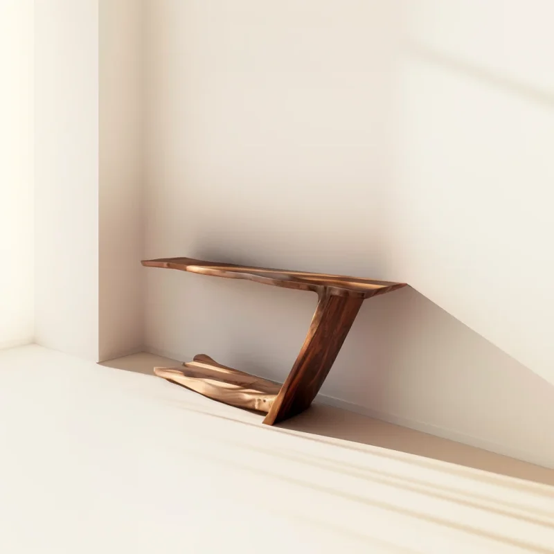 Sculptural console table with asymmetrical leg and open base in modern hallway